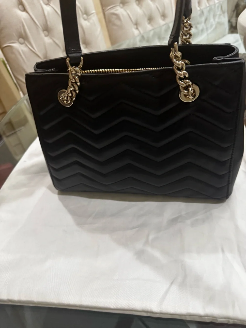 kate spade Black Quilted Chevron Shoulder Bag with Gold Chain Handles.